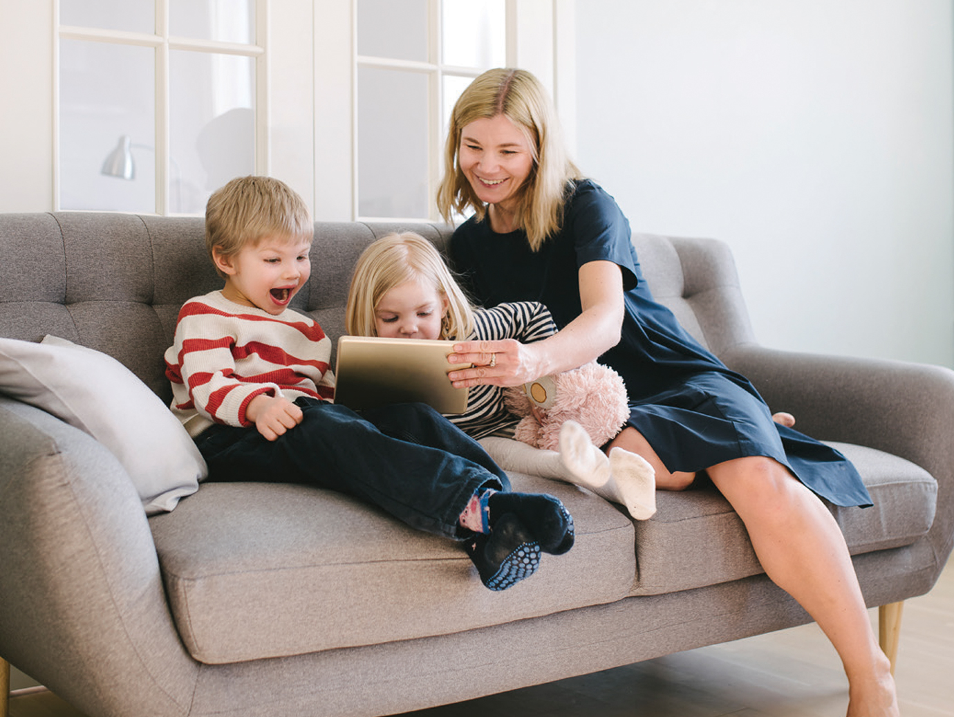 mother and kids playing